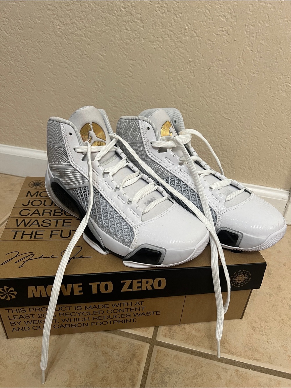 Jordan White and Gold High-Top Basketball Sneakers
